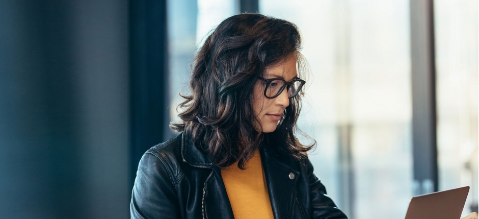 A woman in front of laptop