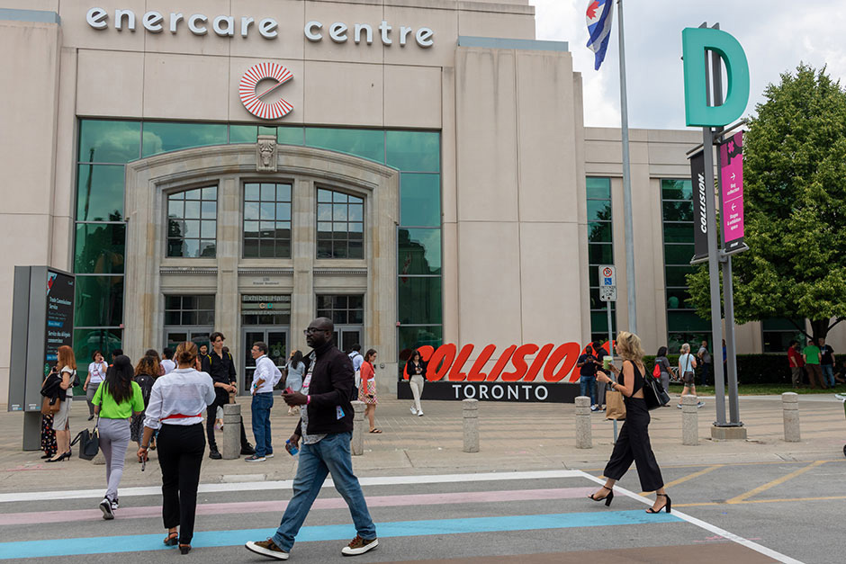 Exterior of the main entrance of the Enercare Centre with a Collision Toronto sign in front of it